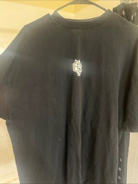 Black Men's Crew Neck T-Shirt with Small Wolf Logo